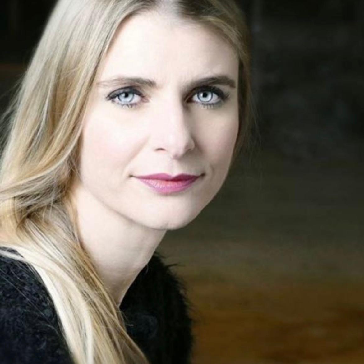 Paola  Tisato 